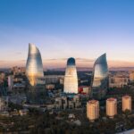 city skyline under blue sky during daytime